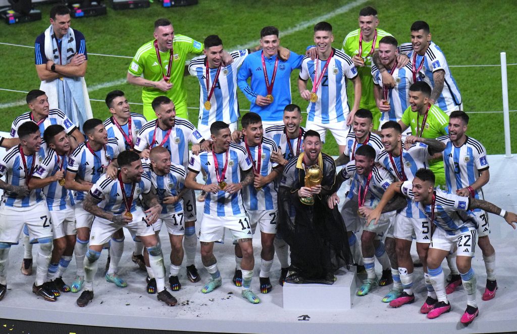 Argentina celebrating with the Finalissima trophy after defeating Italy in the finals